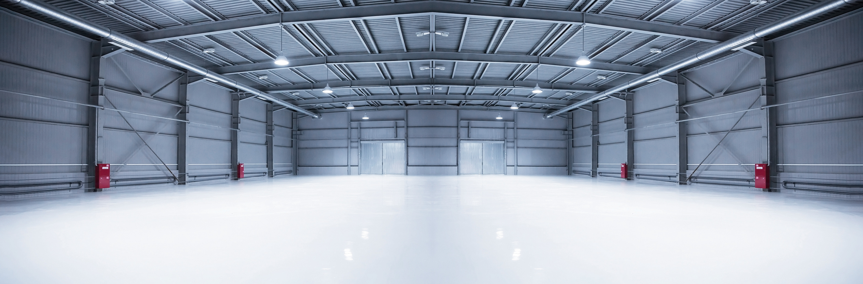 Panorama of Empty Room of Modern Storehouse with Gates and Self-Leveling Floor
